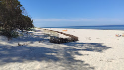 Foto av Ulinia Beach med lång rak strand