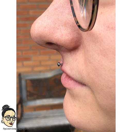 Explore snake tattoo idea, creative tattoo ideas in Oshkosh, available at Piercings by Paige at Big Guns Tattoo
