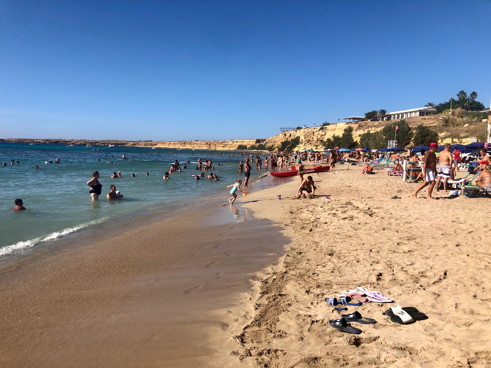 Foto von Magaggiari Strand und die siedlung