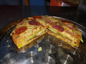 Pizza los ñaños Sto. Domingo.