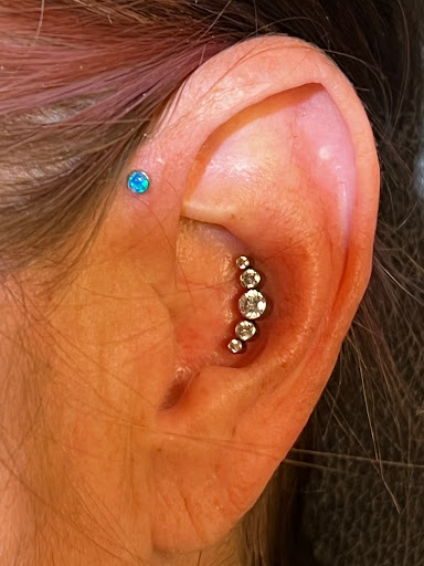 Explore wrist wrap tattoo ideas, creative tattoo ideas in Bradenton, available at Body Effects Tattoo & Piercing