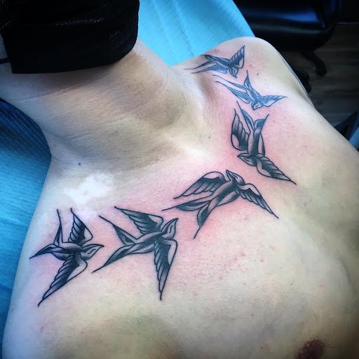 Explore hunting sleeve tattoo ideas, creative tattoo ideas in Madera, available at Sea Wolf Tattoo