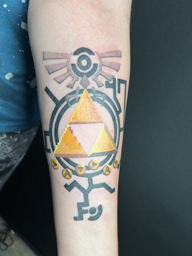 Explore back of arm tattoo ideas, creative tattoo ideas in Buford, available at Wild Tribe Tattoos and Piercings