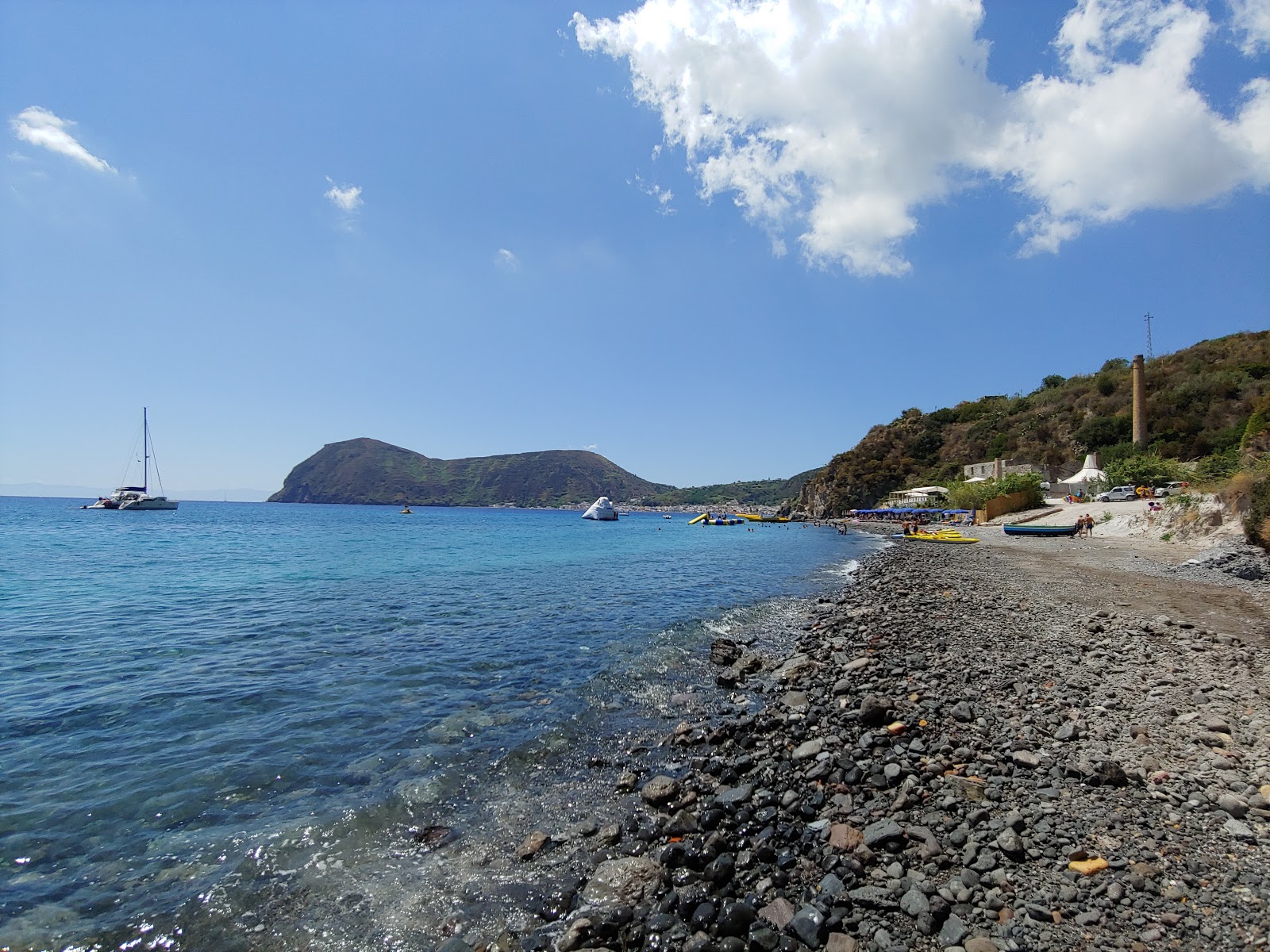 Foto van Spiagge Bianche met ruim strand