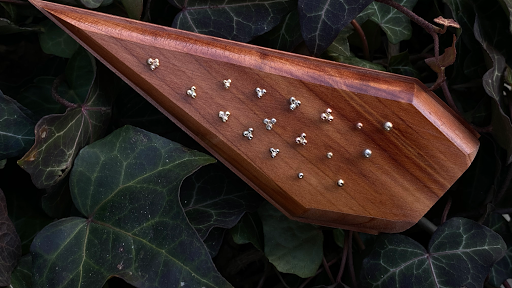 Find tattoo ideas for tummy tuck scars for your next unique tattoo in Greensboro at Fern Piercing and Fine Jewelry