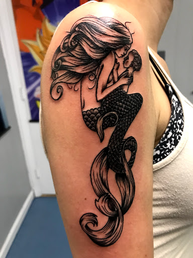 Find female tattoo ideas for women for your next unique tattoo in Muncie at The Tattoo Studio