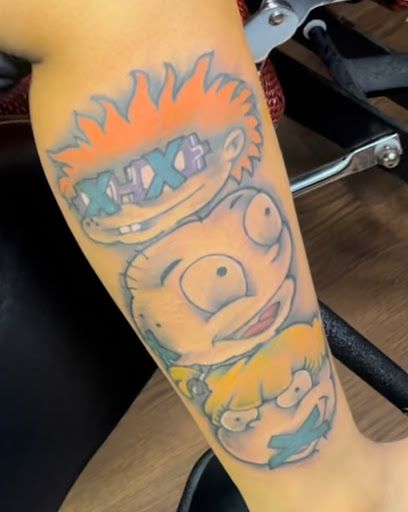 Explore cancer ribbon tattoo ideas, creative tattoo ideas in Raleigh, available at Urban Ink society