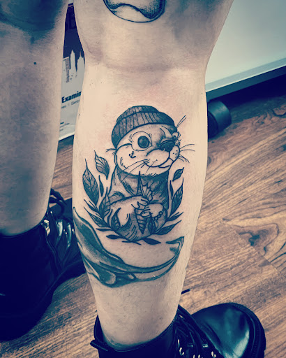 Explore statue tattoo ideas, creative tattoo ideas in Cocoa, available at Rorschach Tattoo Shop and Piercing Studio