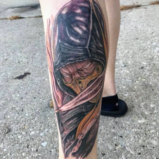 Explore leg tattoo idea for men, creative tattoo ideas in Green Bay, available at Darkside Tattoo By Jesse Skywalker