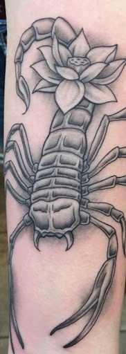 Explore swimming tattoo ideas, creative tattoo ideas in Mesa, available at Ranger Tattoo & Piercing