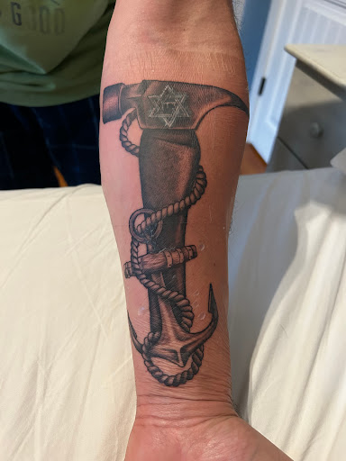 Explore boxer tattoo ideas, creative tattoo ideas in Goffstown, available at Obsidian Moon Tattoo