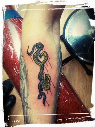 Explore orchid tattoo ideas, creative tattoo ideas in La Crosse, available at La Crosse Tattoo