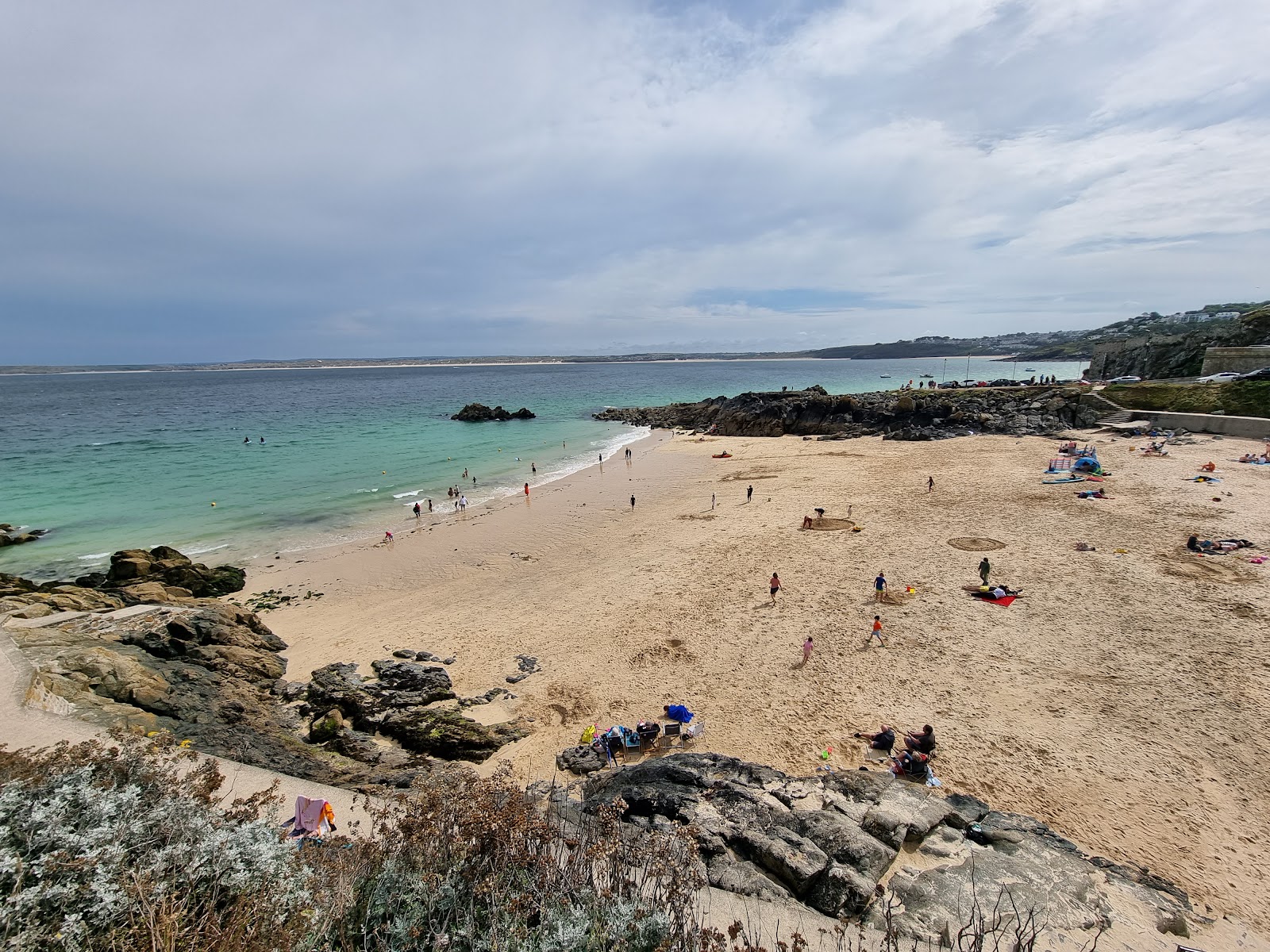 Photo of Porthgwidden Beach surrounded by mountains