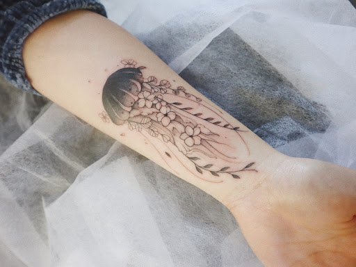 Explore first child tattoo ideas for dad, creative tattoo ideas in Orange, available at Baron Art Tattoo