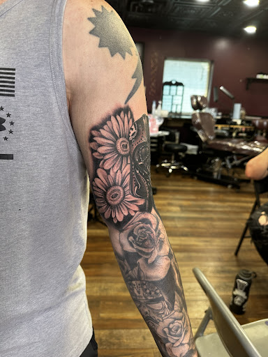 Explore women hand tattoo ideas, creative tattoo ideas in Clarksville, available at Dark Raine Tattoo