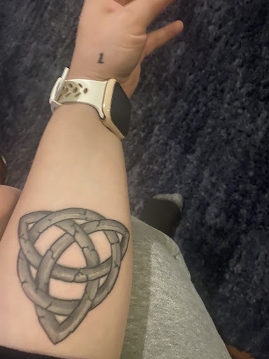 Explore son and daughter tattoo ideas for dad, creative tattoo ideas in Graham, available at Transcendence Art Studio & Tattoo