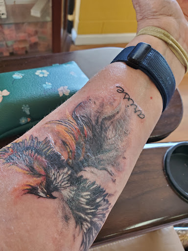 Explore female hand tattoo ideas, creative tattoo ideas in Lavonia, available at Elevated Art Tattoo Studio