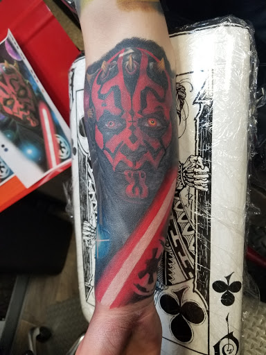 Explore hand tattoo ideas, creative tattoo ideas in Valparaiso, available at Culture Shock