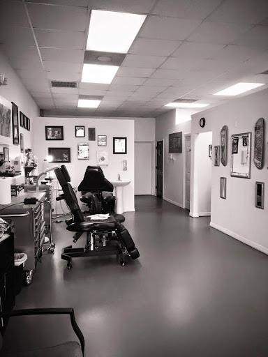 Explore mens upper arm tattoo ideas, creative tattoo ideas in Fort Myers, available at Tiger Lotus Tattoo and Piercing