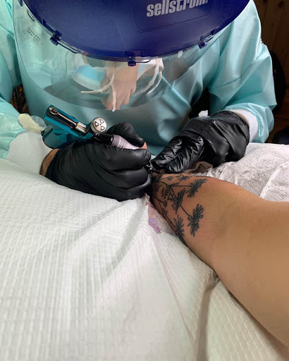 Explore death star tattoo ideas, creative tattoo ideas in Traverse City, available at Black Candle Tattoo Co.