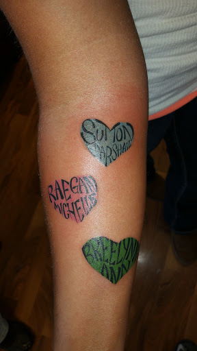 Explore romans 8 18 tattoo ideas, creative tattoo ideas in Foley, available at Black Sheep Custom Tattoos and Piercings