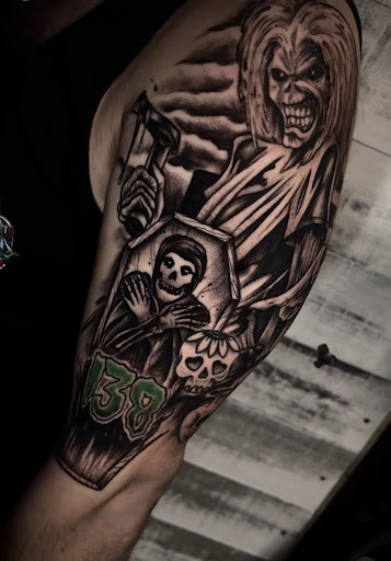 Explore ripped skin tattoo ideas, creative tattoo ideas in Modesto, available at Dying Art Tattoo