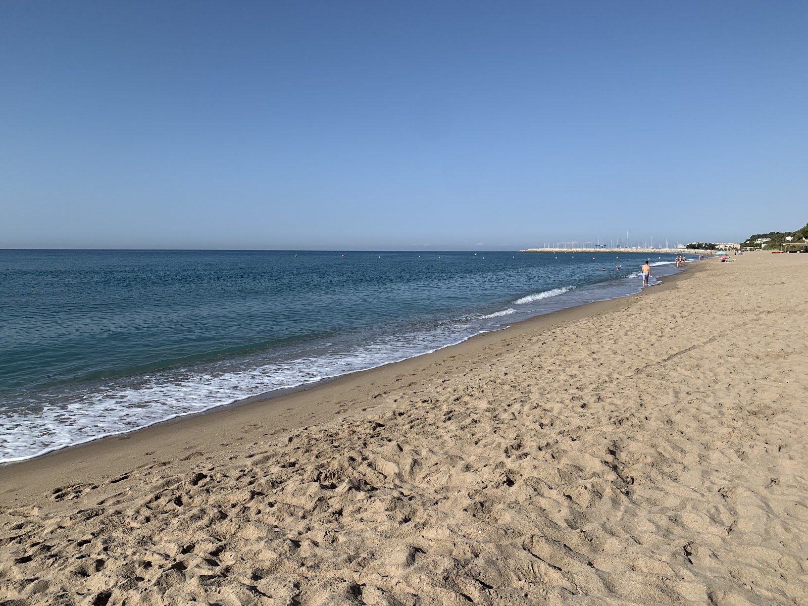 Foto di Platja de Cal Guinovart con una superficie del sabbia beige