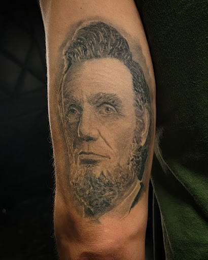 Explore kanye tattoos ideas, creative tattoo ideas in Debary, available at Divine Line Tattoos