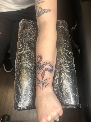 Explore women's wrist tattoo ideas, creative tattoo ideas in Harrisonburg, available at Liberty Street Tattoos