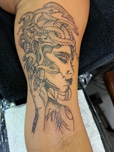 Explore neck tattoo ideas guys, creative tattoo ideas in Philadelphia, available at Tattoo Odyssey Inc