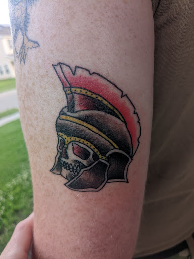 Explore men's face tattoo ideas, creative tattoo ideas in Junction City, available at New Era Tattoo Studio