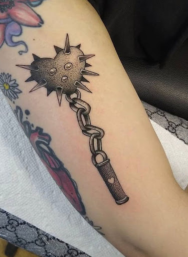 Find charm bracelet tattoo ideas for your next unique tattoo in El Paso at Red Skull Tattoo