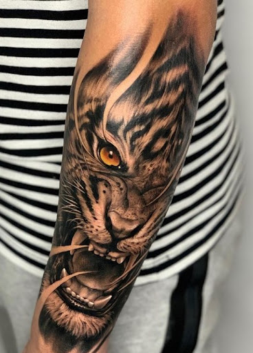 Explore dahlia tattoo ideas, creative tattoo ideas in Venice, available at Ink Monkey Tattoo and Piercing