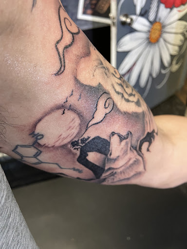 Explore grenade tattoo ideas, creative tattoo ideas in Detroit, available at Detroit Ink Spot