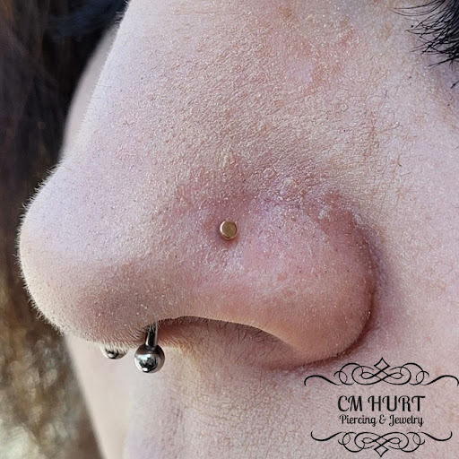 Explore boxing gloves tattoo ideas, creative tattoo ideas in Garden Grove, available at CM Hurt Piercing & Jewelry