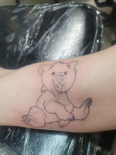 Explore red bird tattoo ideas, creative tattoo ideas in Reno, available at My Religion Tattoo - No Piercing