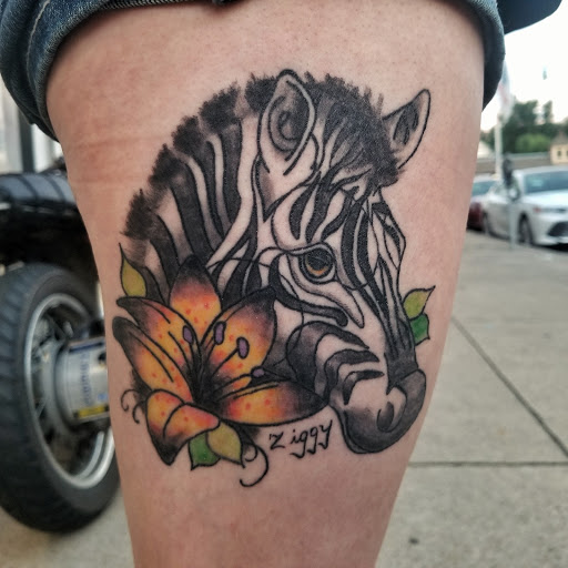 Explore forearm tattoo cover up ideas, creative tattoo ideas in Peckville, available at The Chaotic Cauldron Tattoos and More