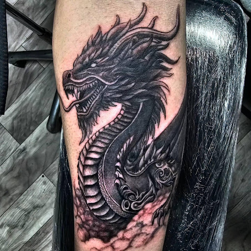 Find boob tattoo ideas for your next unique tattoo in Kenosha at Kenosha Tattoo Company