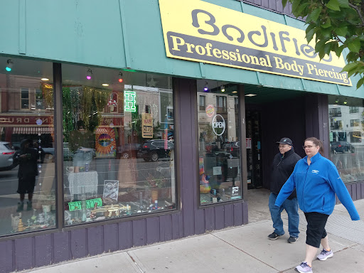 Explore maltese cross tattoo ideas, creative tattoo ideas in Oswego, available at Bodified