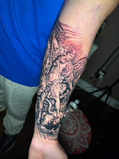 Explore mens back tattoos ideas, creative tattoo ideas in Roanoke, available at Saint Cecilias Art Studio