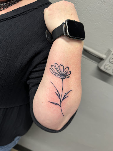 Explore dandelion tattoo ideas, creative tattoo ideas in Zumbrota, available at Art by Sinclair Tattoo Artist At Dry Bones Ink