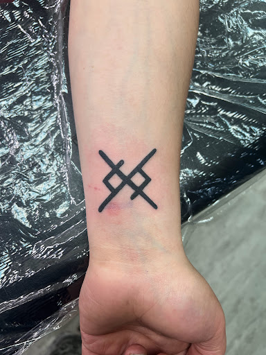 Explore forearm watercolor tattoo ideas, creative tattoo ideas in Alfred, available at Tattooed Spirit