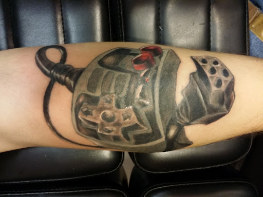 Explore fear god tattoo ideas, creative tattoo ideas in Foley, available at Black Sheep Custom Tattoos and Piercings