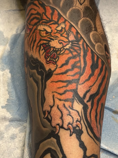 Explore overcome tattoo ideas, creative tattoo ideas in Arlington, available at Benchmark Tattoos