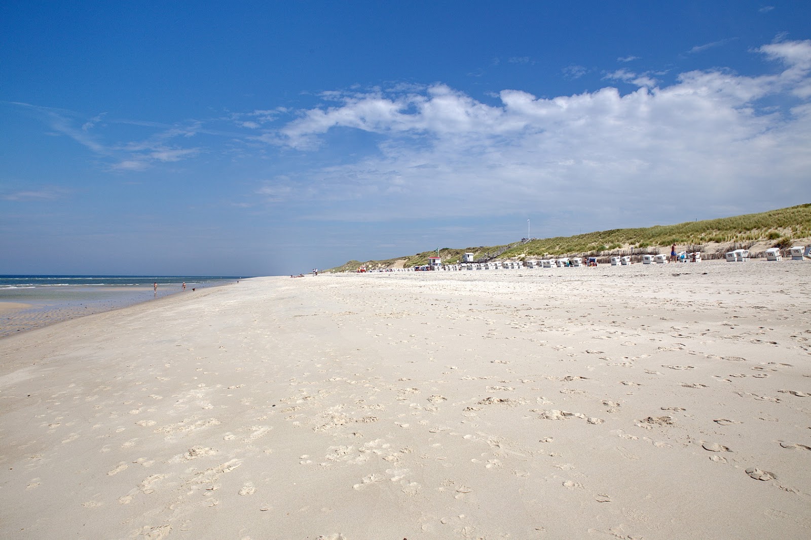 Photo de Weststrand avec sable lumineux de surface