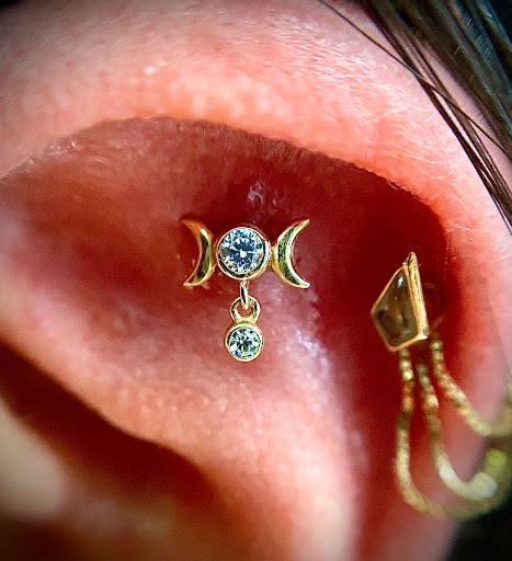 Explore friday 13th tattoo ideas, creative tattoo ideas in Orange, available at Symbiosis Body Piercing