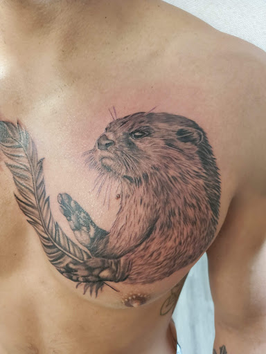 Explore name tattoo ideas chest, creative tattoo ideas in Oakwood, available at Underground Ink