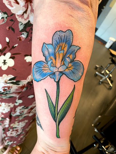Find unique family tattoo ideas for your next unique tattoo in Palm Harbor at Angry Owl Tattoo and Piercing