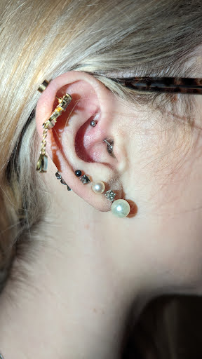 Explore small coraline tattoo ideas, creative tattoo ideas in Myrtle Beach, available at Elite Body Piercing