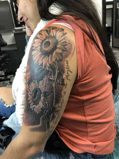 Explore scroll tattoo ideas, creative tattoo ideas in San Diego, available at Inkfinite Artistry